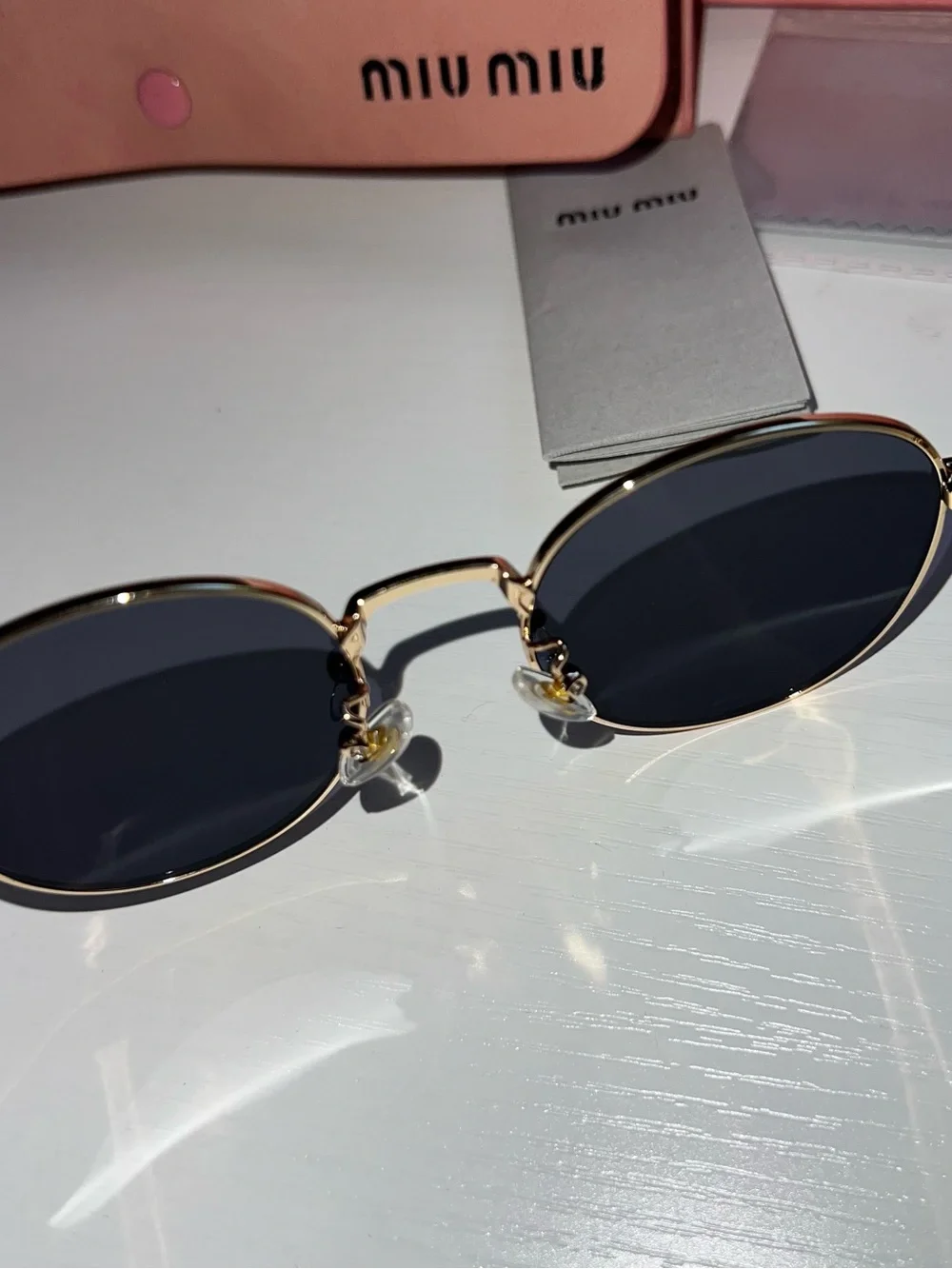 Miu Miu Gold Metal Round Sunglasses with Black Lenses